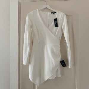 White Lulu’s long sleeve romper